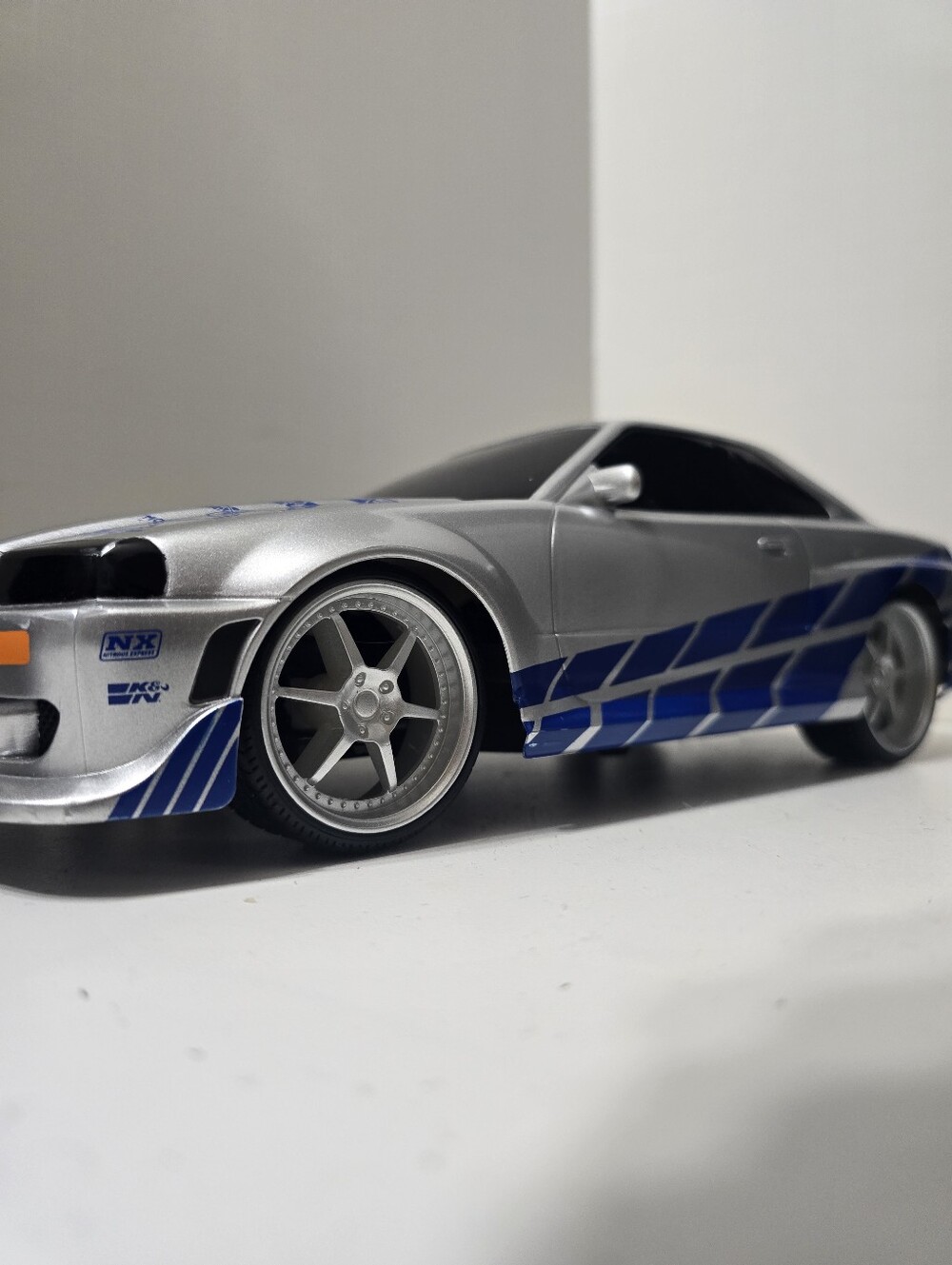 Silver and blue Jada Toys Fast & Furious remote-controlled Nissan Skyline GT-R